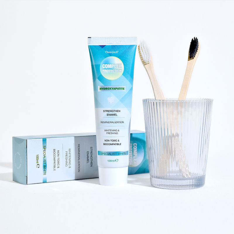 মাঝারি হোয়াইটিং এফেক্ট দাঁত হোয়াইটিং টুথপেস্ট দিয়ে দাঁত ব্রাশ করুন দিনে দুবার এবং সোডিয়াম ফাইট্যাট উপাদান